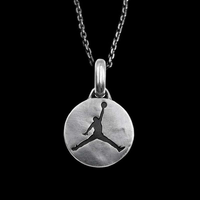 Michael Jordan Necklace stands as a beacon of style resilience and triumph Hover Image
