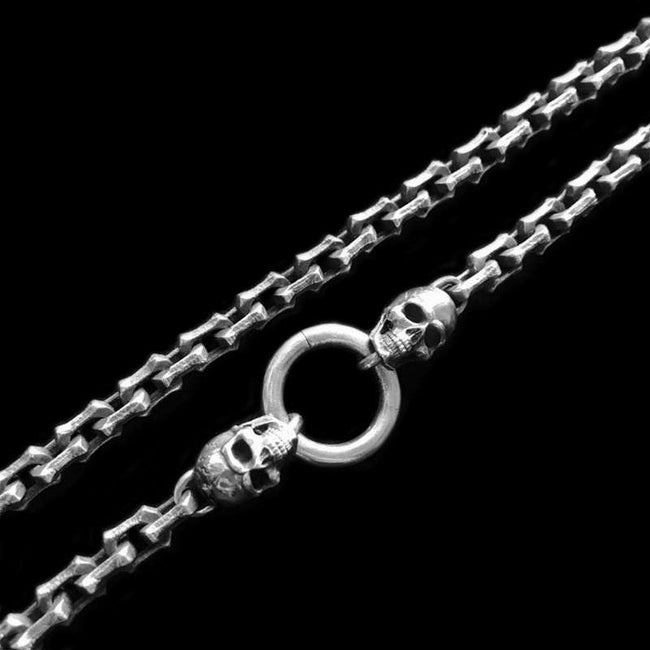 Discover the Rugged and Domineering Edges of Corners Skull Necklaces Hover Image