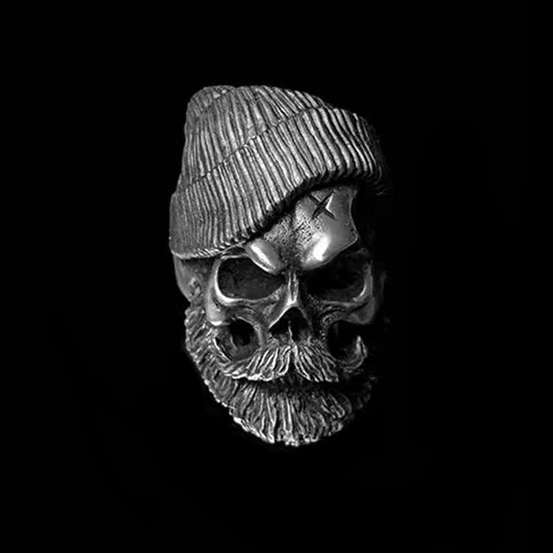 Bearded tough guy wearing hat skull rings for men