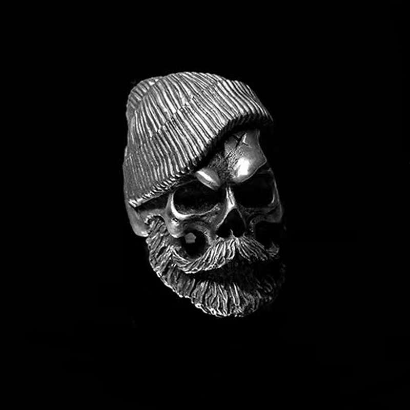 Bearded tough guy wearing hat skull rings for men