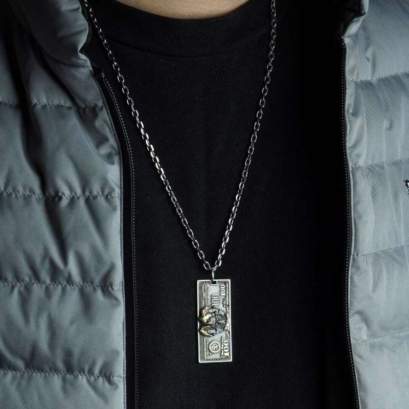 JOKER Dollar Sterling Silver Pendant lies a story of inspiration and creativity