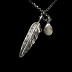 Snake necklace & perfect combination of snakes and feathers