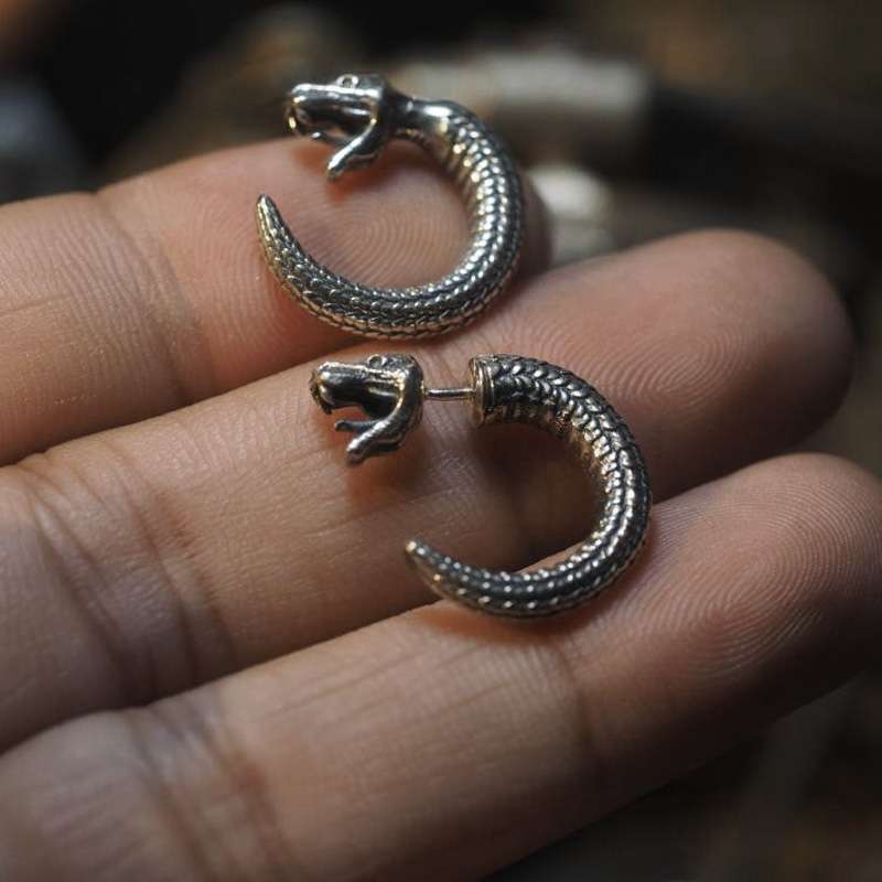 Snake stud earrings - powerful aura of confidence and strength