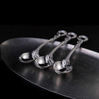 Silver Spoon Sterling silver snake swallowing egg coffee spoon