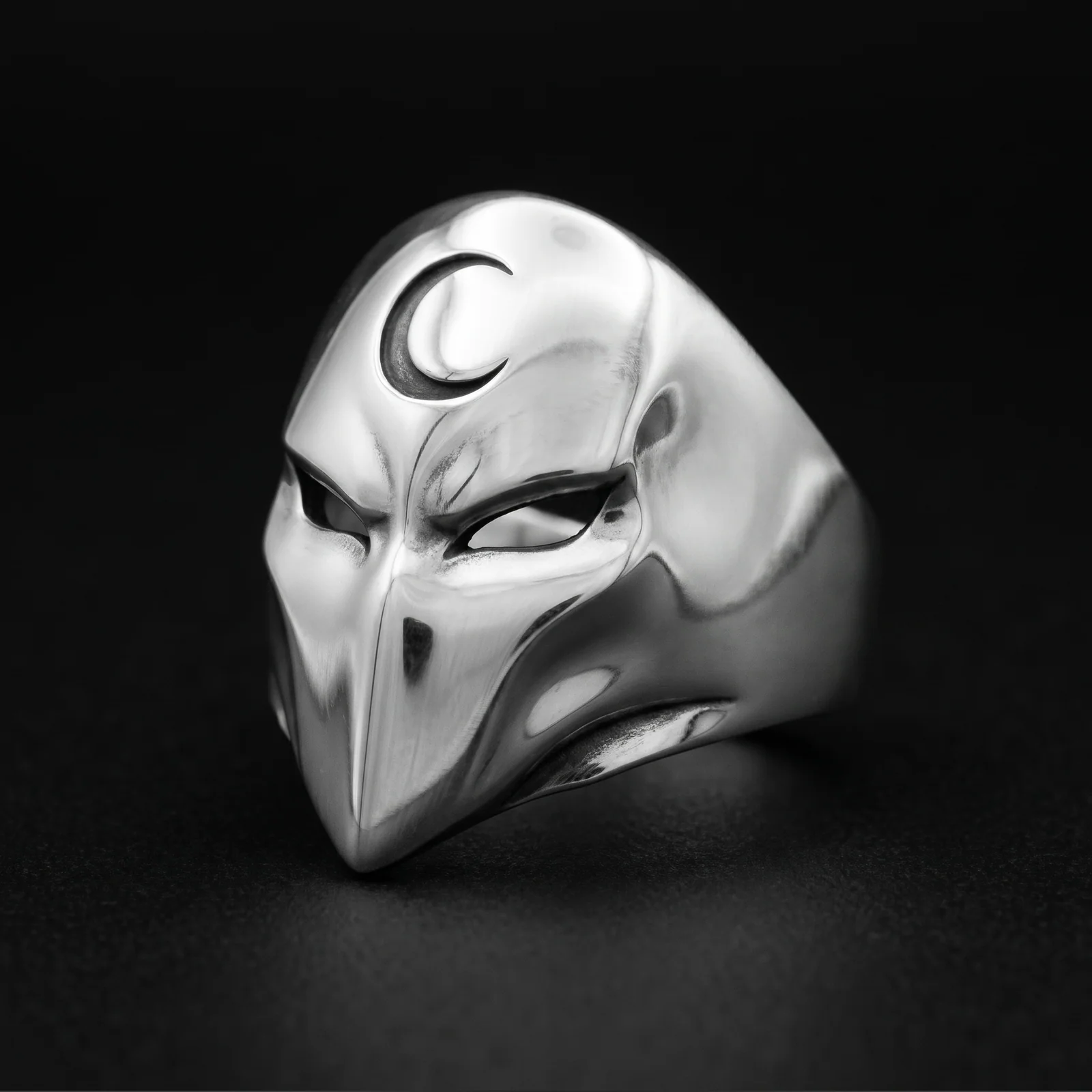 Phantom face ring left three-quarter view showing the open eye and smooth tapered mask plane