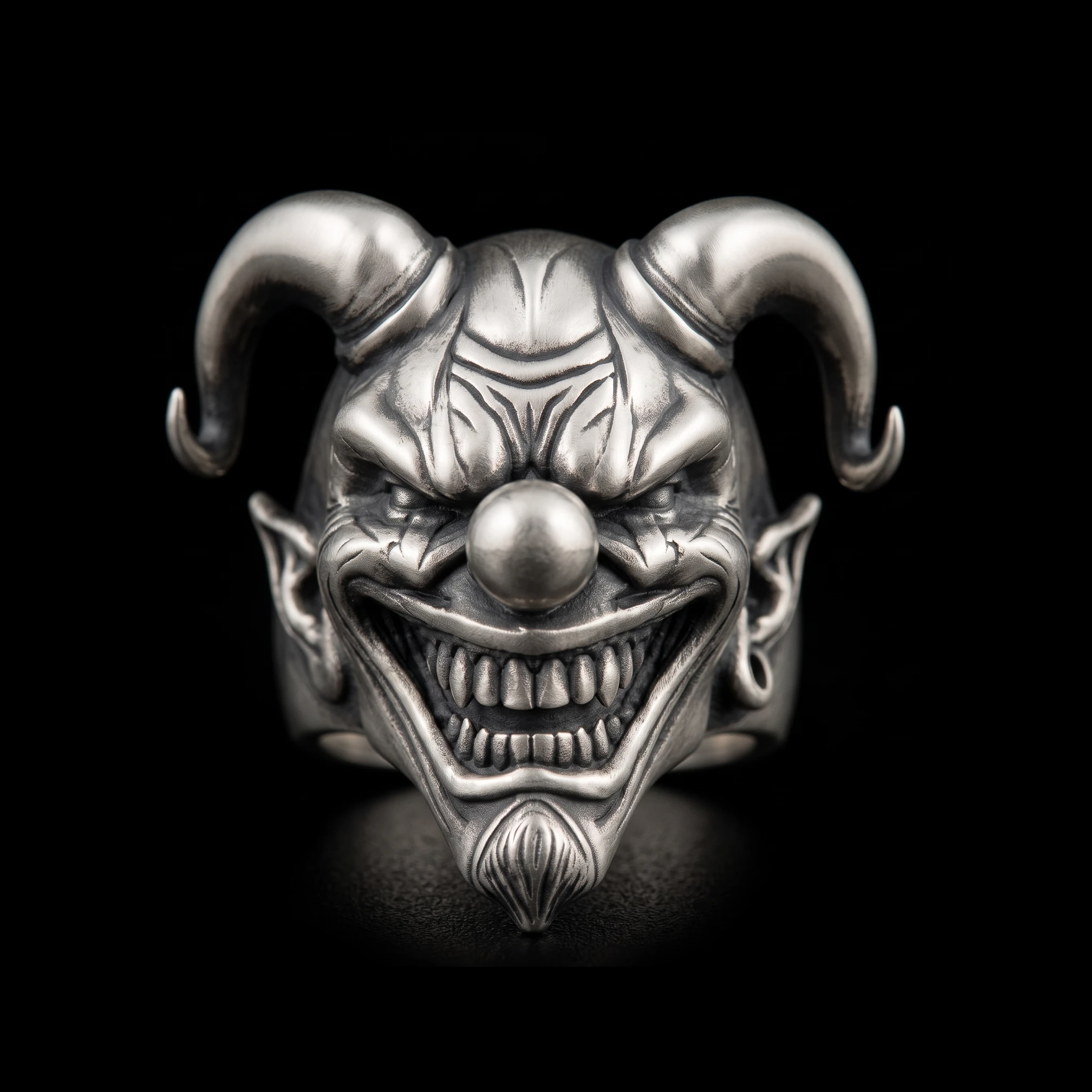 Horned jester ring front view with twin curled horns