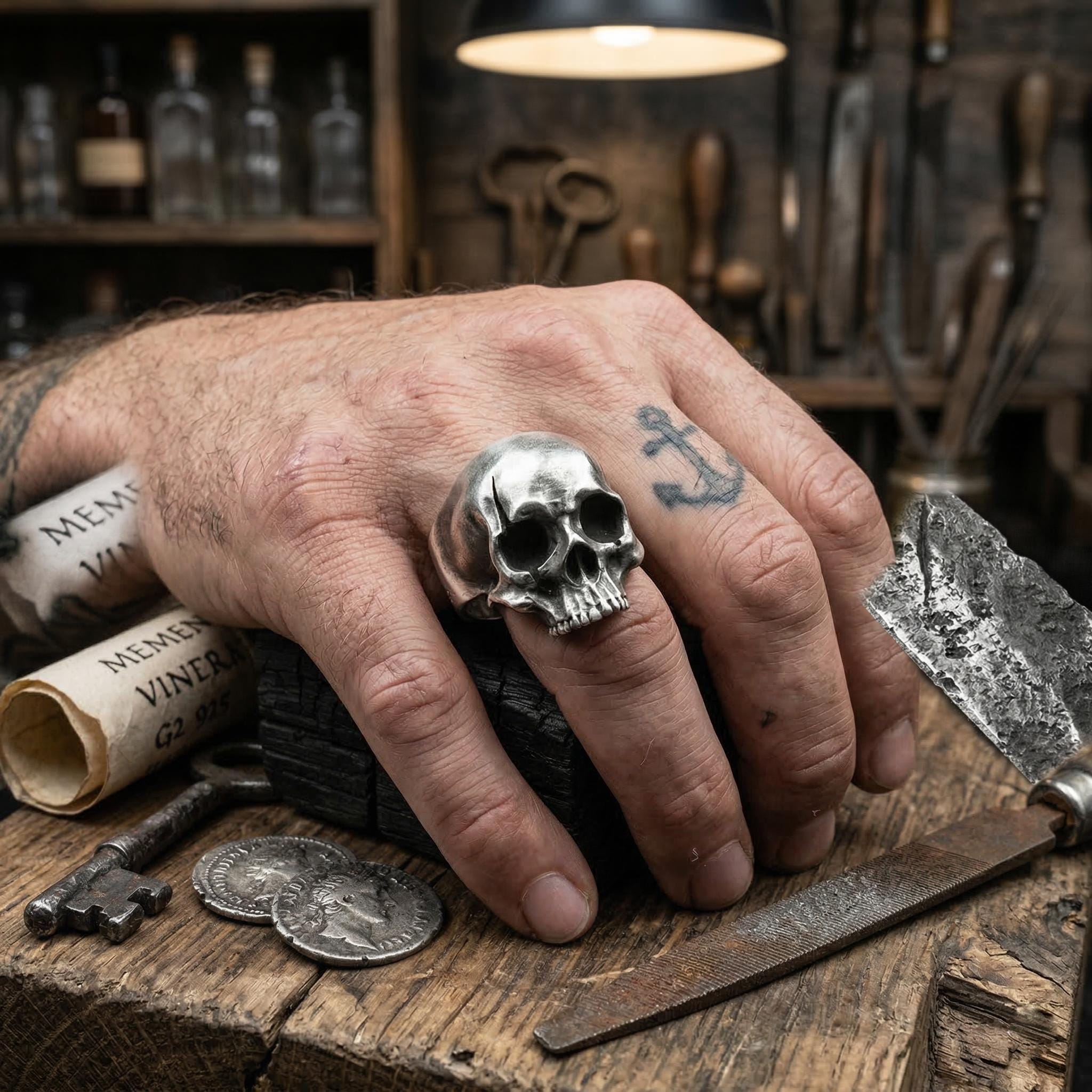 Heavy full jaw skull ring worn on hand for scale