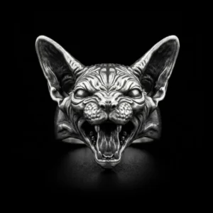 Sphynx cat ring front view with upright ears, wrinkled face and open fanged mouth