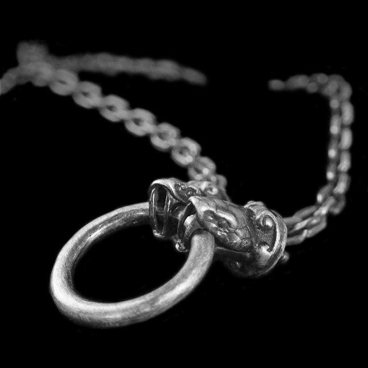 Elevate Your Style with the Two Headed Snake Bite Ring Silver snake chain necklace