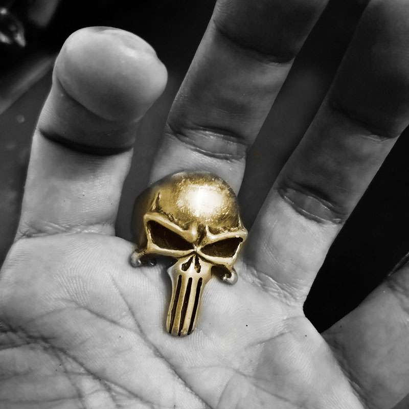 Unleash Your Edge with the Brass Skull Punisher Ring