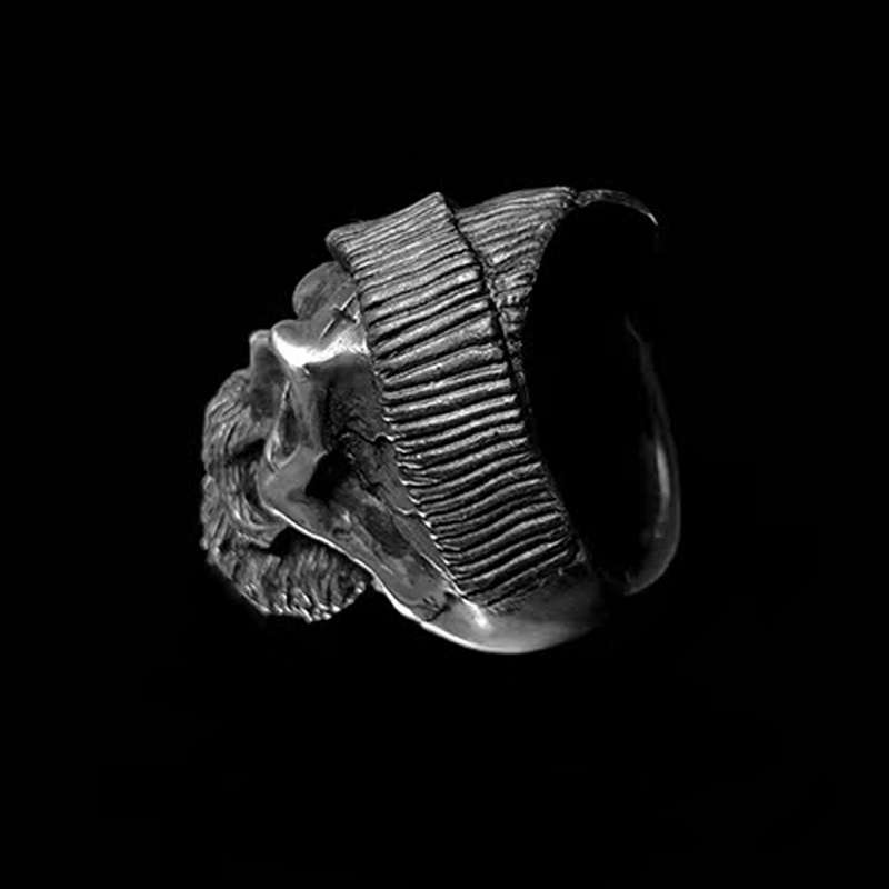 Bearded tough guy wearing hat skull rings for men